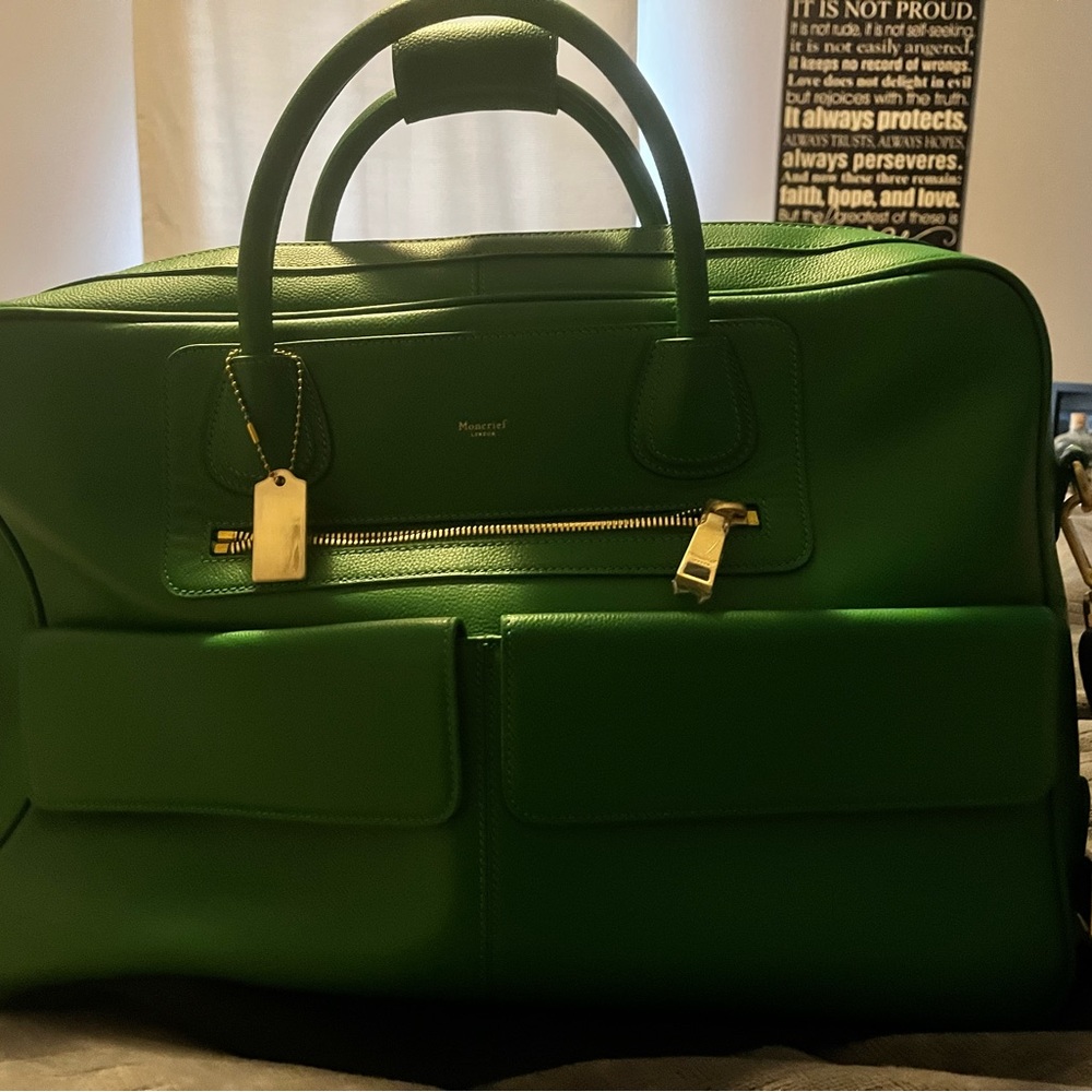 Brand new with tags, designer weekender bag. Great for quick trips!